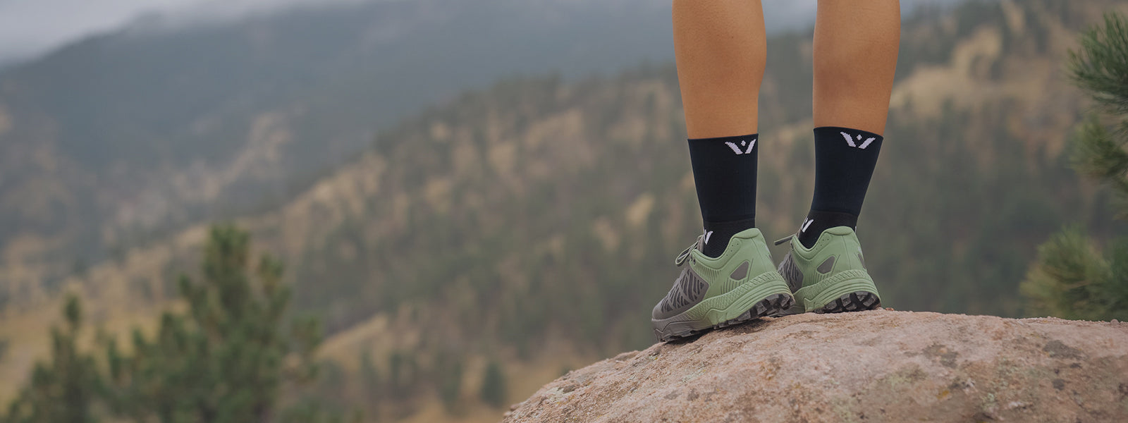 Women's Quarter Crew Socks header image, woman hiking
