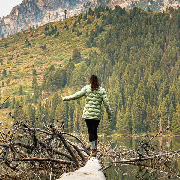 Woman hiking, wearing Swiftwick socks